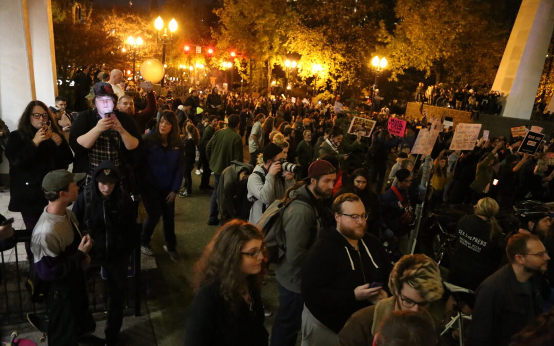 Police call N. Portland protest a riot; downtown protesters dismantle fences on 52nd night of protests